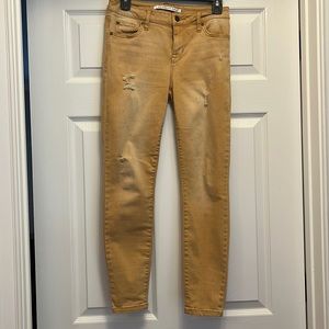 Celebrity Pink distressed gold colored jeans. Mid rise ankle skinny. Size 5/27